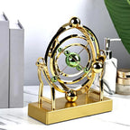 Escultura Cinética de Pêndulo Celestial