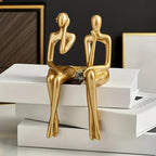 Conjunto de Estatuetas Douradas em Resina