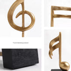 Estatuetas Decorativas de Notas Musicais em Resina Dourada