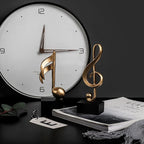 Estatuetas Decorativas de Notas Musicais em Resina Dourada