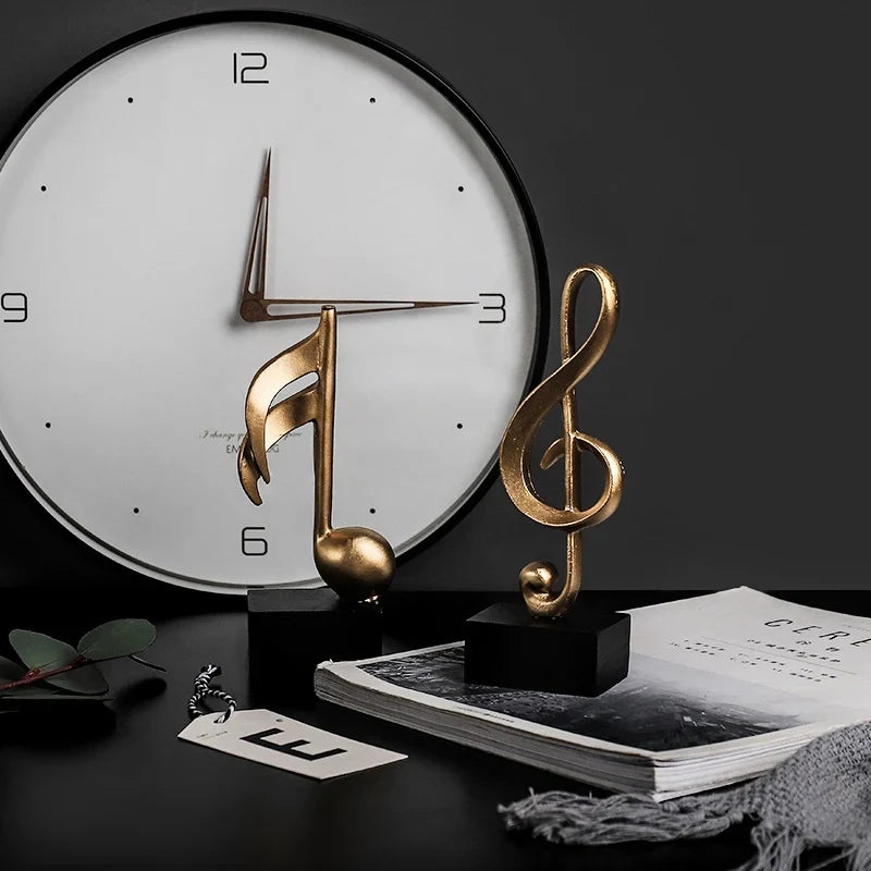 Estatuetas Decorativas de Notas Musicais em Resina Dourada