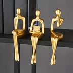 Conjunto de Estatuetas Douradas em Resina